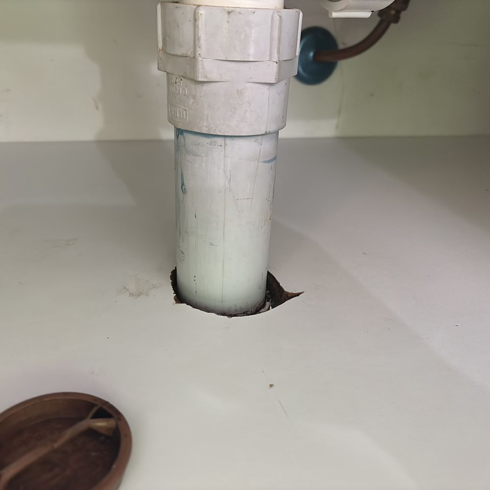 Water damage to the cabinet under a sink, found during a pre-purchase inspection in Braybrook