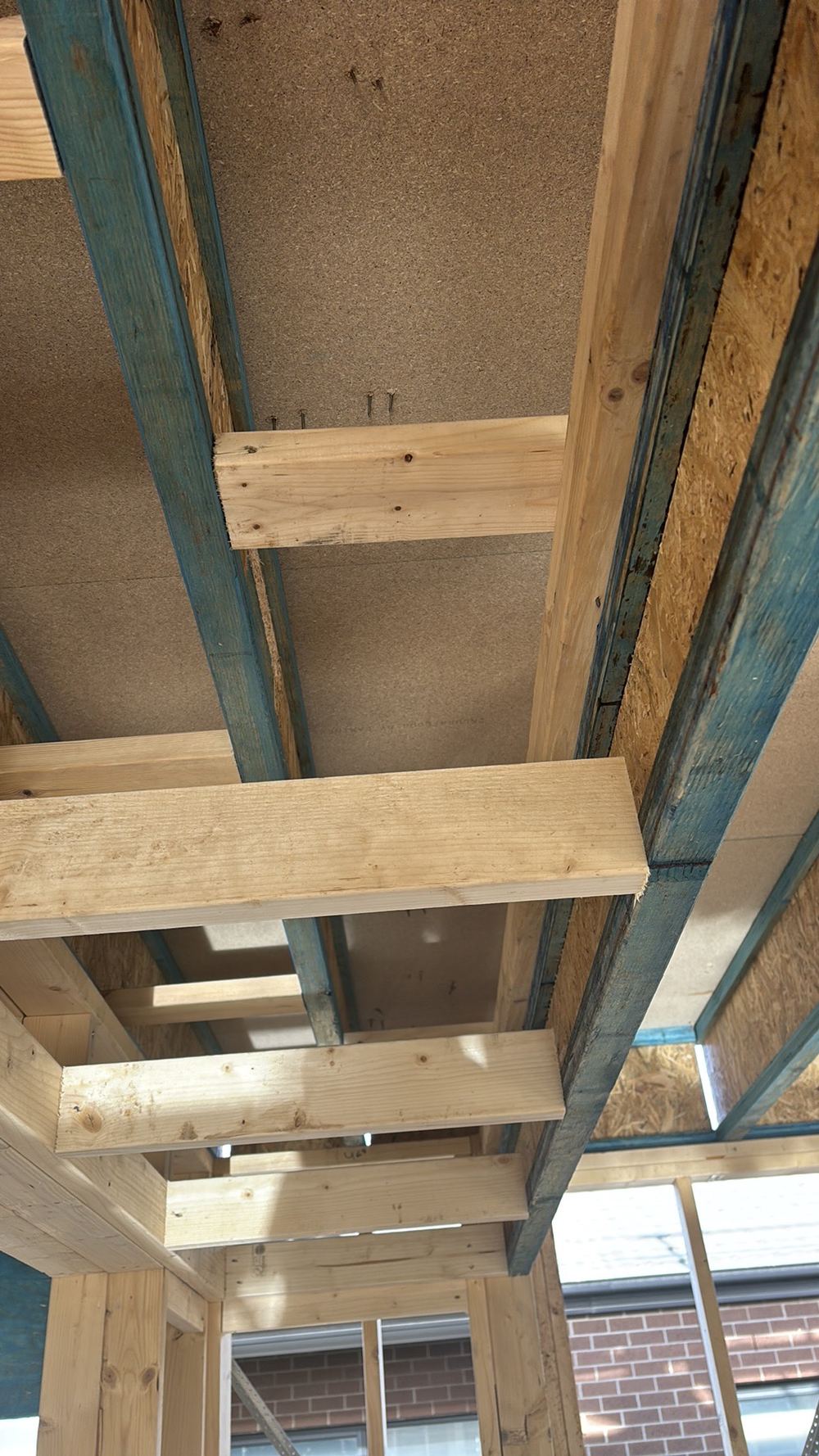 Upstairs walls not landing over the floor trusses meant to carry them, found during a frame stage inspection in Manor Lakes