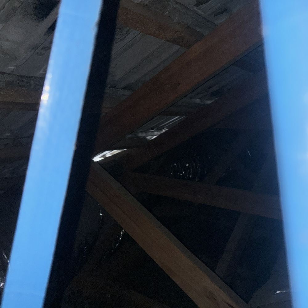 Cracked roof tiles letting water into the roof space, found during a defect investigation inspection in South Kingsville