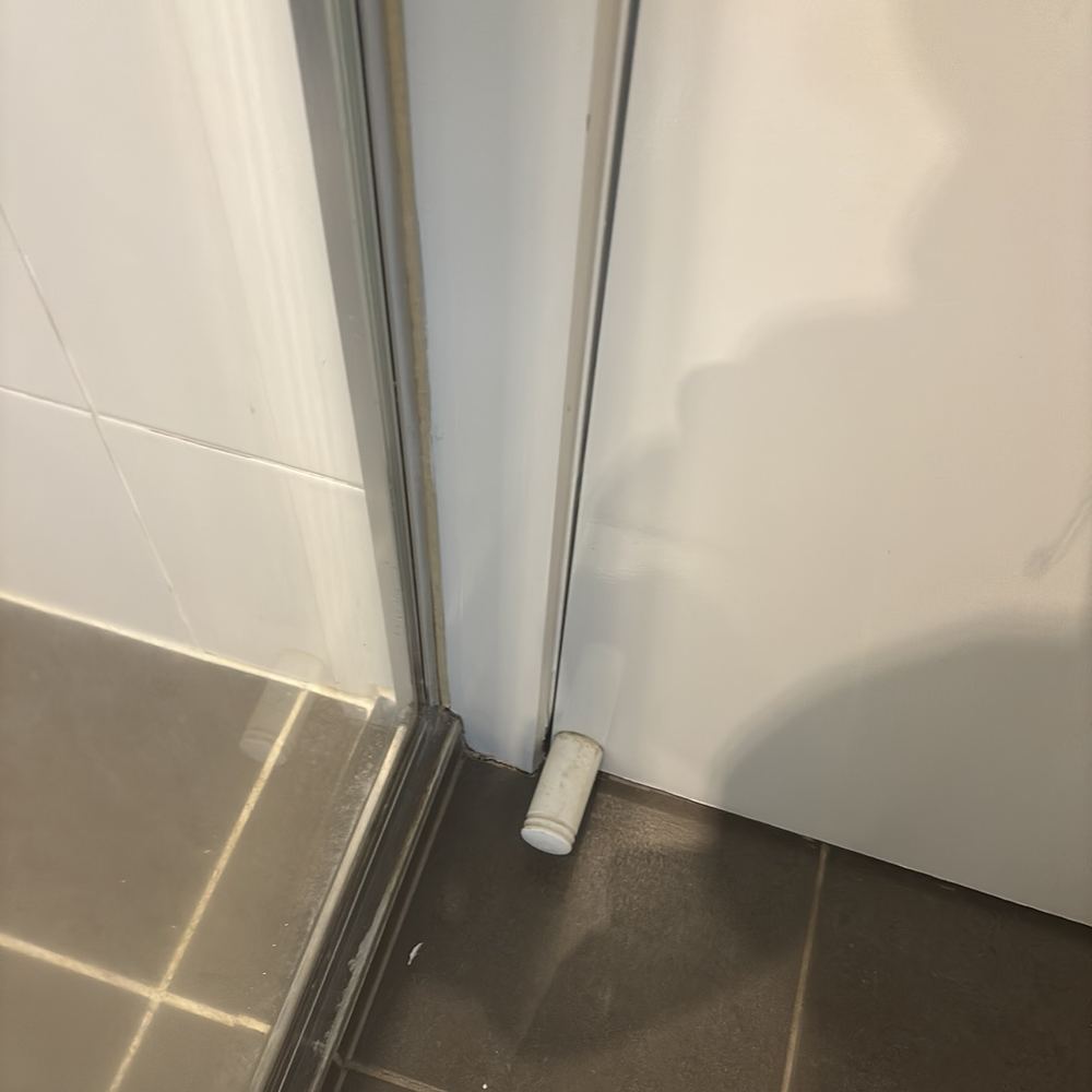 Door binding in its frame, a common sign of movement, found during a defect investigation inspection in South Kingsville