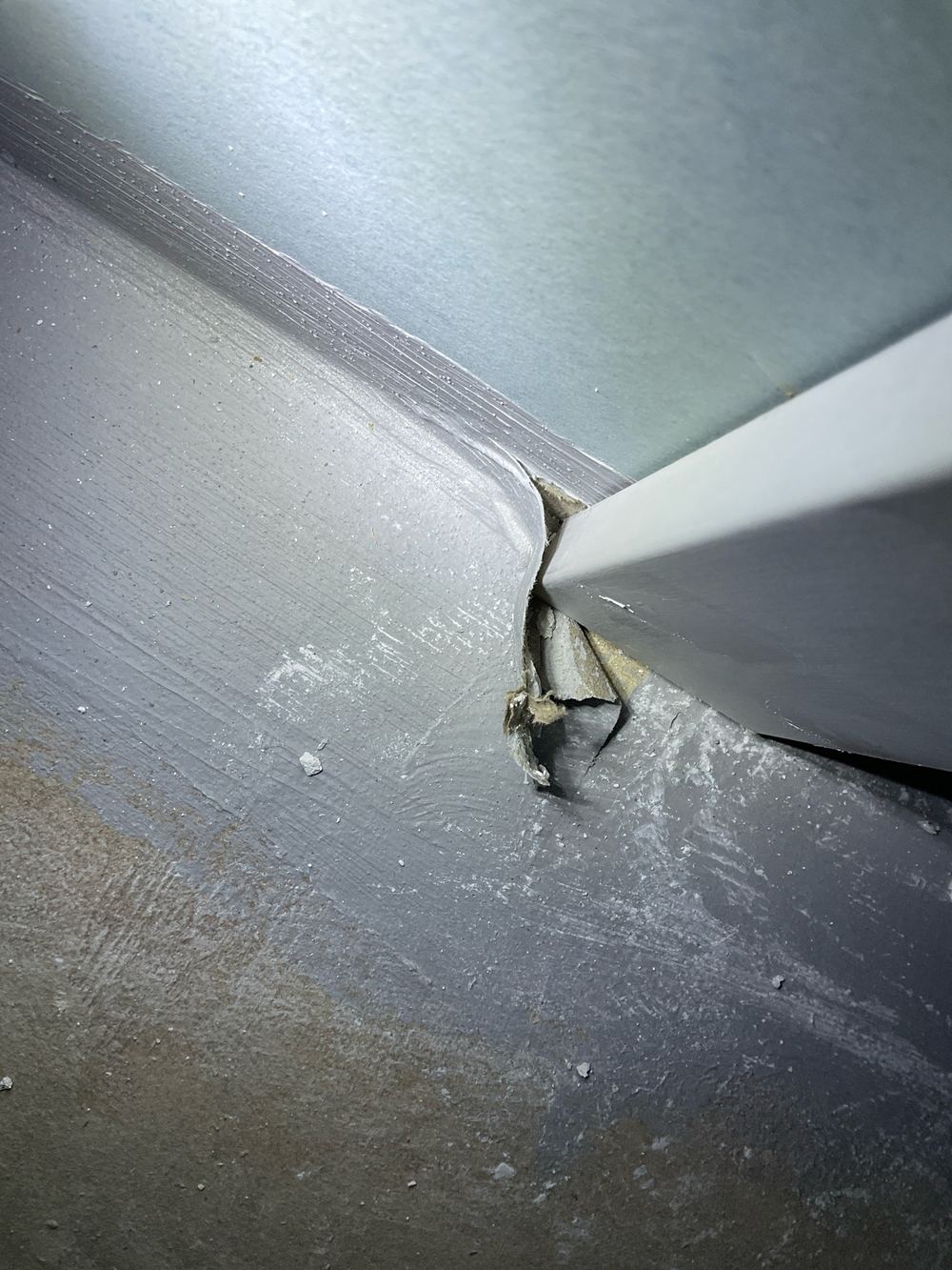 Membrane damaged before tiling, so it must be repaired first, found during a waterproofing stage inspection in Manor Lakes